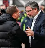  ??  ?? Craig Levein (right) claimed players in the Premiershi­p need protected from Celtic’s Scott Brown