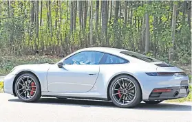  ??  ?? The new 911 has already been caught testing virtually undisguise­d several times.