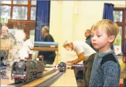  ?? Pictures: Andy Jones FM5055345/FM5055354 Buy pictures from kentonline.co.uk ?? Atticus, four, and Peter and John Smith at the get-together of the French Railways Society at Lenham Community Centre