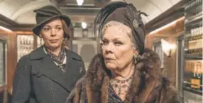  ?? Nicola Dove, Twentieth Century Fox ?? Olivia Colman, left, and Judi Dench star in “Murder on the Orient Express.”