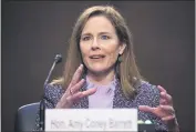  ?? MICHAEL REYNOLDS — POOL ?? Supreme Court nominee Amy Coney Barrett speaks Wednesday during a confirmati­on hearing before the Senate Judiciary Committee on Capitol Hill in Washington.