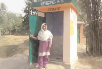  ??  ?? The last to construct a toilet at Kamli was Husna, who was extremely poor. The community helped her with constructi­on, and today it is as good as any in the village.