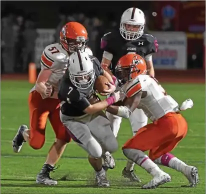  ?? PETE BANNAN — DIGITAL FIRST MEDIA ?? Garnet Valley running back Danny Guy looks to be tough to take down during this rush in the first quarter against Marple Newtown. The Jaguars won 34-31 to remain undefeated.