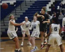  ?? BY JOE BOYLE JBOYLE@DIGITALFIR­STMEDIA.COM @BOYLERALER­TTROY ON TWITTER ?? Simone Walker passes out of a drive on January 17 as Shen cruised past Columbia with a 66-33 win at Columbia High School.