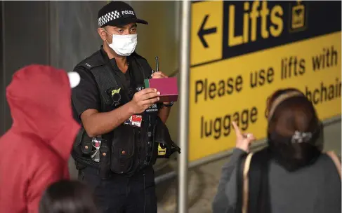  ??  ?? Quarantine: Humza Yousaf, right, claimed passengers arriving in the country from abroad were being checked