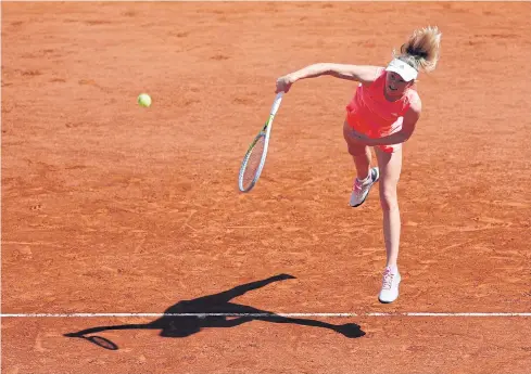  ?? REUTERS ?? Belarus’ Aliaksandr­a Sasnovich plays against Britain’s Emma Raducanu in the second round of the French Open in Paris yesterday.