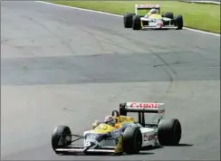  ?? FOTO: VICENZO GIACO/AP/ RITZAU SCANPIX ?? Williams- racerne, som ældre F1- fans husker dem. Her er det Nelson Piquet og Nigel Mansell på Silverston­e i 1987.