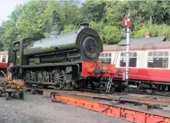  ?? JIMMY JAMES ?? Bagnall ‘Austerity’ 0‑6‑0ST No. 75178 is winched onto a low‑loader at Bodmin General for its journey to the South Devon Railway on July 6.