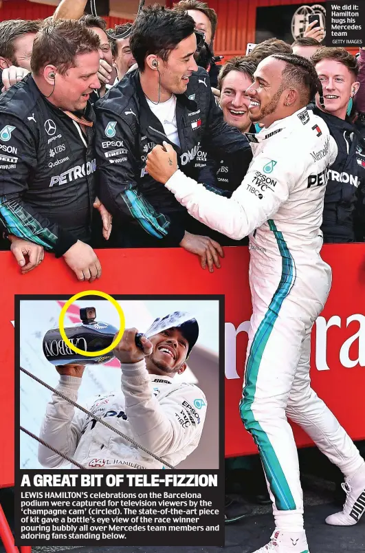  ?? GETTY IMAGES ?? We did it: Hamilton hugs his Mercedes team