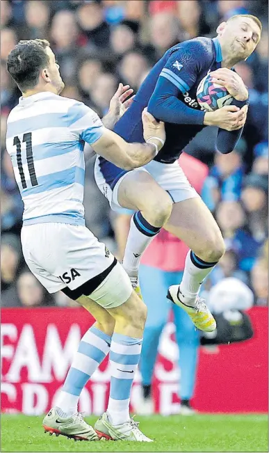  ?? ?? Man of the Match Finn Russell takes control ahead of Argentina’s Emiliano Boffelli