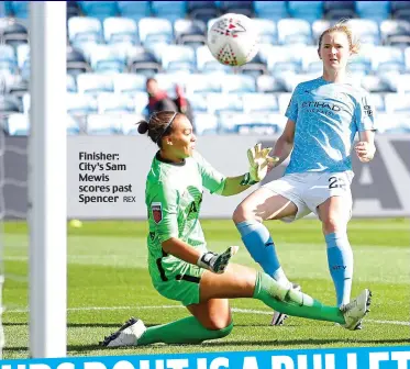  ?? REX ?? Finisher: City’s Sam Mewis scores past Spencer