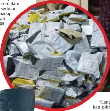  ??  ?? LONGGOKAN produk yang siap dibungkus untuk dihantar kepada pembeli.