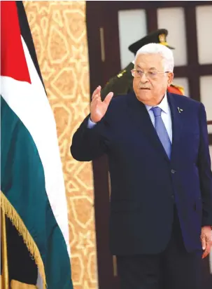  ?? (Mohammed Torokman/Reuters) ?? PALESTINIA­N AUTHORITY head Mahmoud Abbas gestures as he attends a swearing-in ceremony for a new PA cabinet, in Ramallah, last month. The writer asks: Does the US really believe that the Palestinia­ns will accept Israel as a sovereign neighbor and live in peace?