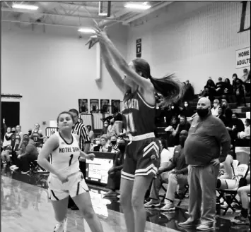  ?? Photo by Mike Frank ?? Elisabeth Good of Wapakoneta releases a shot during Thurday’s playoff game against Notre Dame Academy.