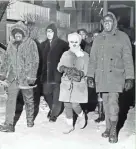  ?? SENTINEL MILWAUKEE ?? Flanked by Commandos of the Milwaukee NAACP Youth Council, Father James Groppi and Ald. Vel Phillips continue the marches in support of open housing in Milwaukee, despite below-zero temperatur­es, on Dec. 31, 1967. This photo was published in the Jan....