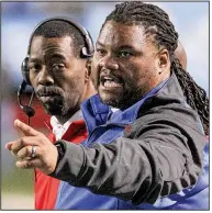  ?? Democrat-Gazette file photo ?? Little Rock McClellan Coach Maurice Moody (right) said he hopes to mold the Lions into state-title contenders again this season, the final one for the school.