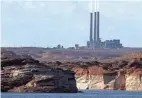  ??  ?? The Navajo Generating Station northeast of Grand Canyon National Park is visible from Lake Powell in Page, Ariz.