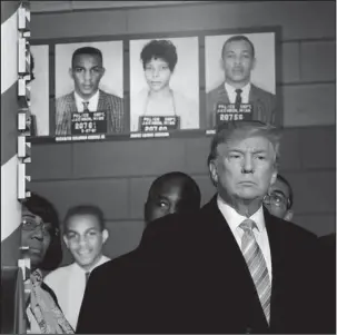  ?? The Associated Press ?? MUSEUM TOUR: President Donald Trump gets a tour of the newly-opened Mississipp­i Civil Rights Museum on Saturday in Jackson, Miss. Trump paid tribute Saturday to the leaders and foot soldiers of the civil rights movement whose sacrifices help make the...