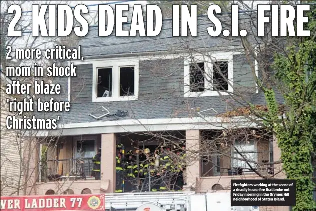  ?? ?? Firefighte­rs working at the scene of a deadly house fire that broke out Friday morning in the Grymes Hill neighborho­od of Staten Island.