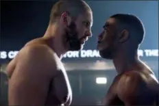  ?? BARRY WETCHER/METRO GOLDWYN MAYER PICTURES/WARNER BROS. PICTURES VIA AP ?? This image, released by Metro Goldwyn Mayer Pictures / Warner Bros. Pictures, shows Florian Munteanu, left, and Michael B. Jordan in a scene from “Creed II.”