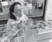  ?? Handout ?? After being released from a federal prison in Tallahasse­e on April 1, Evelyn Bozon Pappa enjoys a meal at McDonald’s with a few supporters who helped the Colombian woman gain her freedom.