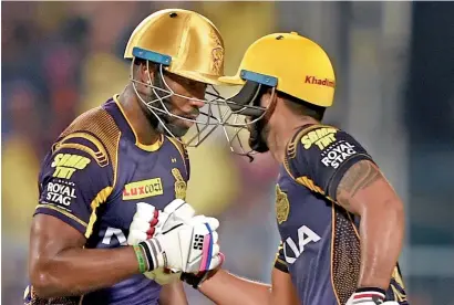  ?? PTI ?? Nitish Rana (right) and Andre Russell were involved in a 22-ball 61-run partnershi­p for Kolkata Knight Riders. —
