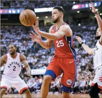  ?? FRANK GUNN — THE CANADIAN PRESS VIA AP ?? Could the Sixers try to make a trade for LeBron James by enticing them with Ben Simmons? Jac McCaffery says they should go for it.