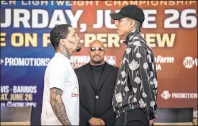  ?? Amanda Westcott SHOWTIME ?? Gervonta Davis, left, fights Saturday for the first time as a junior welterweig­ht against Mario Barrios at Atlanta’s State Farm Arena.