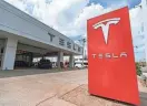  ?? NATHAN J. FISH/THE OKLAHOMAN ?? A Tesla showroom is pictured in Oklahoma City on Tuesday.