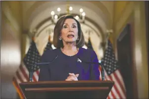  ?? The Associated Press ?? FORMAL INQUIRY: House Speaker Nancy Pelosi of Calif., reads a statement announcing a formal impeachmen­t inquiry into President Donald Trump, on Capitol Hill in Washington, Tuesday.