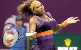  ?? Osama Faisal
/
The Associated Press ?? Serena Williams returns the ball Tuesday against Daria Gavrilova of Russia on the second day of the WTA Qatar Ladies Open in Doha, Qatar.