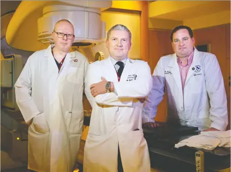  ?? JULIE OLIVER ?? The University of Ottawa Heart Institute team working on the non-invasive procedure to fix a deadly heart arrhythmia in mere minutes includes, left to right, Dr. Andrew Crean, Dr. Calum Redpath and Dr. Graham Cook.