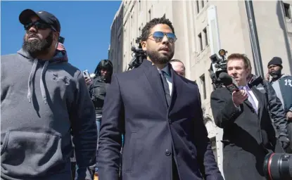  ??  ?? Jussie Smollett leaves court in March 2019 after the Cook County state’s attorney’s office dropped all charges against him.