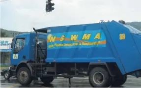  ??  ?? A National Solid Waste Management Authority truck.