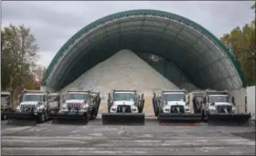  ?? ERIC BONZAR — THE MORNING JOURNAL ?? Roughly 6,000 tons of road salt is ready for snow plow drivers at the Ohio Department of Transporta­tion’s Lorain County Garage in Oberlin on Oct. 31.