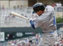  ?? JIM MONE — THE ASSOCIATED PRESS ?? The Indians’ Bradley Zimmer grounds into an RBI fielder’s choice off Twins relief pitcher Buddy Boshers in the sixth inning during the first game.