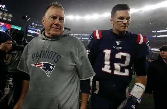  ?? NANCY LANE / HERALD STAFF FILE ?? GOOD 10 YEARS: Head coach Bill Belichick and former quarterbac­k Tom Brady were each selected to the Pro Football Hall of Fame’s All-Decade team.