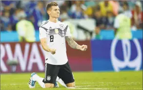  ?? Odd Andersen / Getty Images ?? Germany’s Toni Kroos celebrates after his goal helped Germany defeat Sweden 2-1 at the World Cup on Saturday.