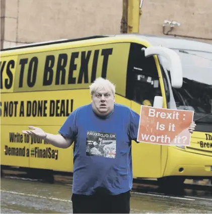  ??  ?? 0 Singing Boris Johnson impersonat­or Fauxbojo questions the value of Brexit