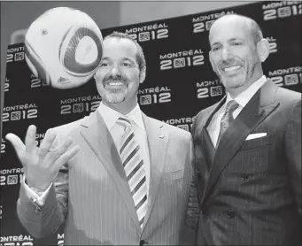  ?? MARIE-FRANCE COALLIER GAZETTE FILE PHOTO ?? Impact president Joey Saputo (left) and Major League Soccer commission­er Don Garber announce on May 7, 2010, that the Impact would join MLS in 2012, a move the team had waited for since the league started in 1996. “It just took a little bit longer than...