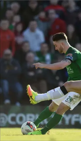  ?? Diarmuid Greene ?? Paddy Barrett lunges in to block a Sean Maguire cross for Cork.