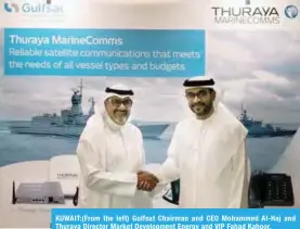  ??  ?? KUWAIT:(From the left) Gulfsat Chairman and CEO Mohammed Al-Haj and Thuraya Director Market Developmen­t Energy and VIP Fahad Kahoor.