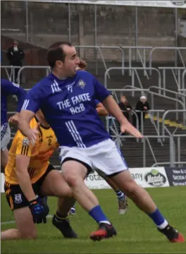  ??  ?? Daniel Carolan in possession for Slane, with Podge McGowan in support.