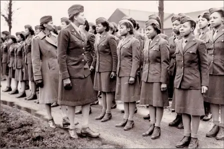  ??  ?? Members of the 6888th battalion stand in formation in 1945 in Birmingham, England. (AP/U.S. Army Women’s Museum)