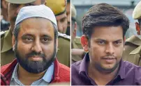  ??  ?? Amanatulla­h Khan and Prakash Jarwal being produced at the Tees Hazari Court in New Delhi on Wednesday. —