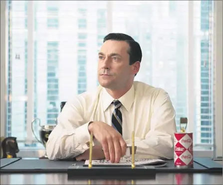  ?? Justina Mintz AMC ?? DON DRAPER (Jon Hamm) & Co. are back in AMC’s “Mad Men,” in a half-season in which life progresses yet cycles back to the start.