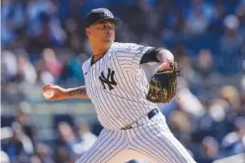  ?? AP PHOTO/FRANK FRANKLIN II ?? New York Yankees' Luis Gil pitches April 7 during an MLB game against the Toronto Blue Jays in New York.