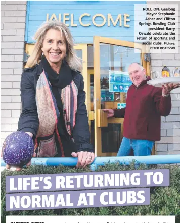  ?? Picture: PETER RISTEVSKI ?? ROLL ON: Geelong Mayor Stephanie Asher and Clifton Springs Bowling Club president Barry Oswald celebrate the return of sporting and social clubs.