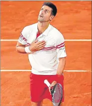  ?? REUTERS ?? Serbia's Novak Djokovic celebrates winning his semi-final match against Spain's Rafael Nadal in Paris on Friday.