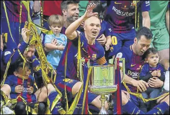  ?? REUTERS ?? Andres Iniesta (centre) was understand­ably tearful after Barcelona’s King’s Cup win.